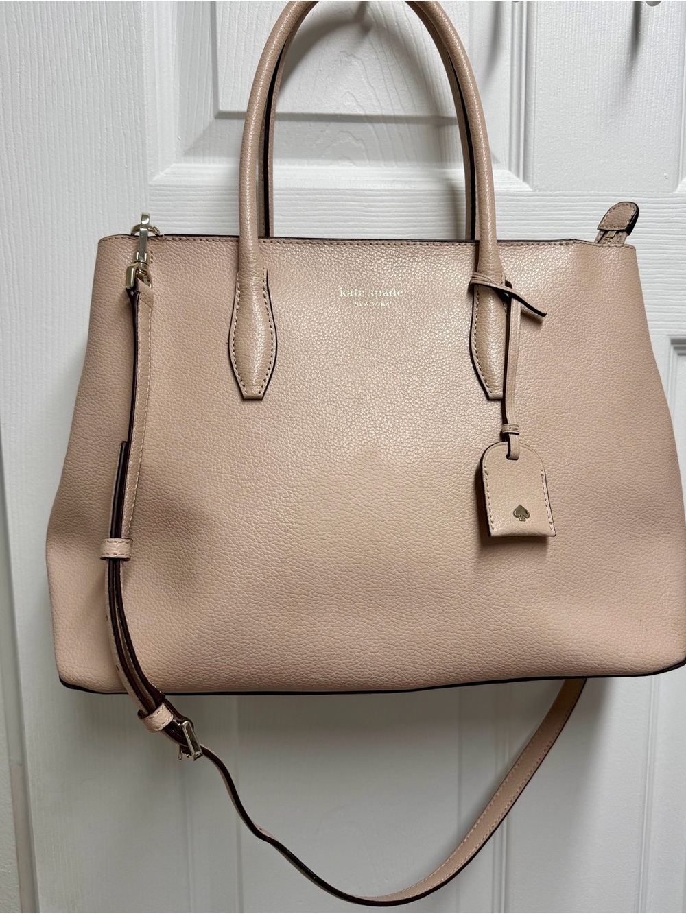 Kate Spade blush pink pebble leather satchel w/ gold-tone accents (12. X 9.75)